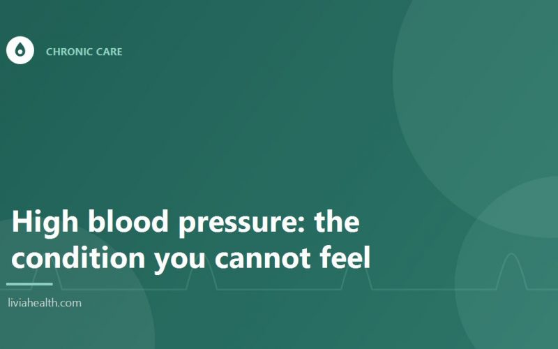 Blood pressure cuff being used to take a reading
