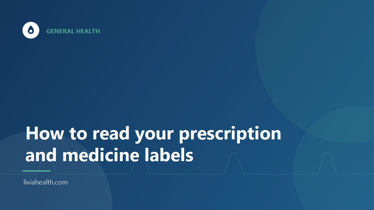 Person reading the label on a box of medicine